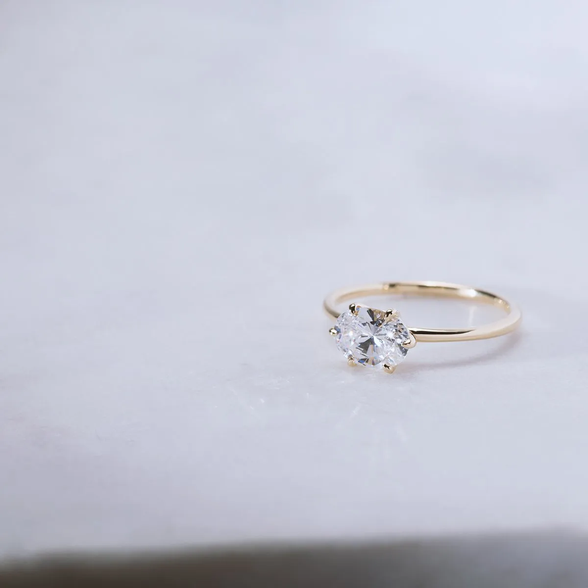 East-West Hidden Halo Engagement Ring