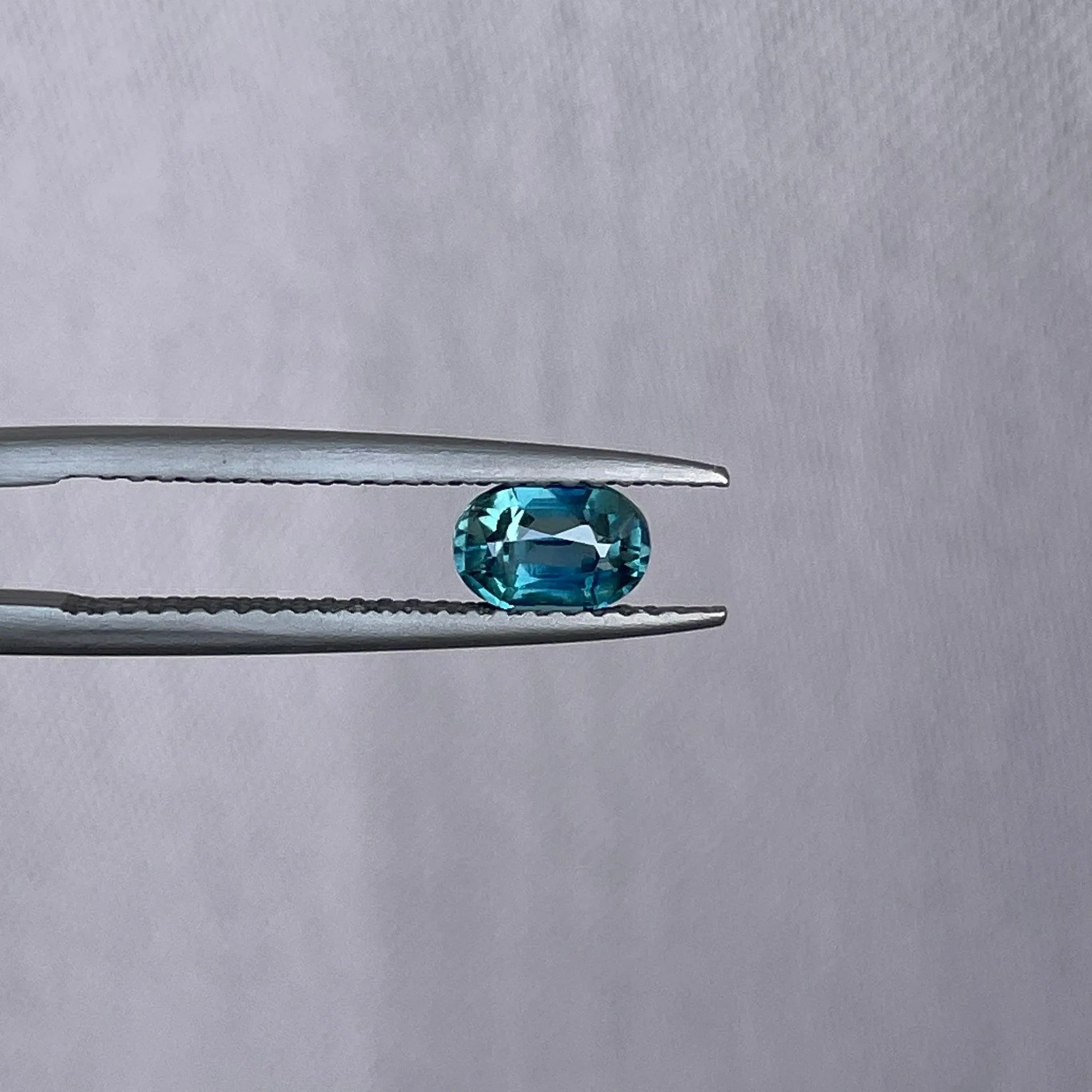 Loose sapphire heated certified blue green oval shape cut natural 0.73 ct